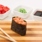 gunkan with salmon on a wooden Board. Japanese cuisine